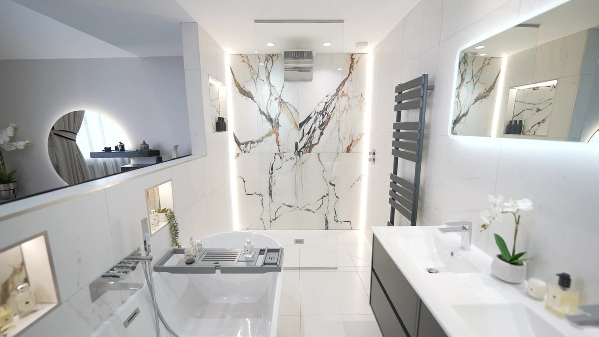 Ensuite by Lisa Hensby Design & Build Studio with a freestanding bath, a marble-effect walk-in shower and illuminated mirrors.
